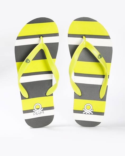 grey and yellow slippers