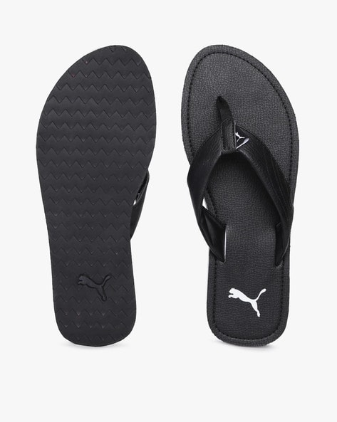 puma flip flops black