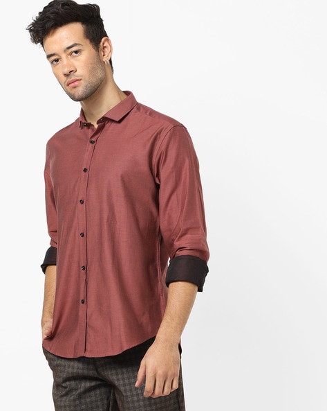 copper color shirt