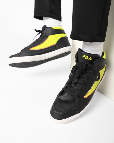 fila black and yellow shoes