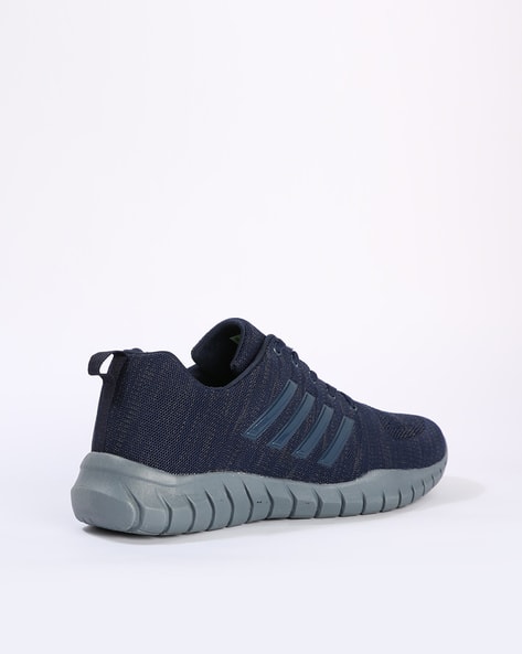 Buy Navy Sports Shoes for Men by DUKE Online | Ajio.com