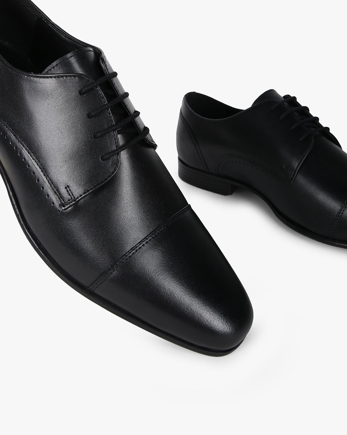 black leather toe cap shoes