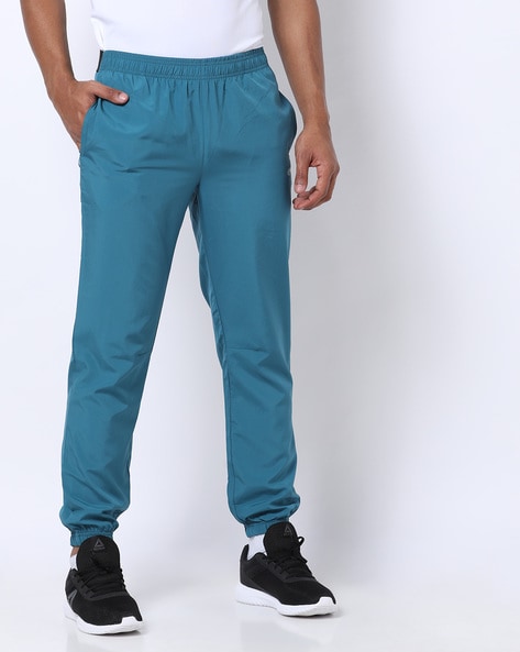 teal track pants