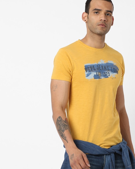 mustard yellow shirt with jeans