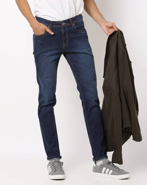 mid wash jeans men