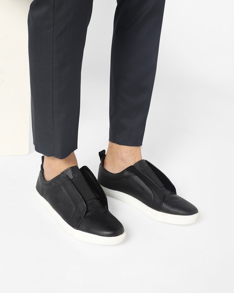 faux leather slip on sneakers