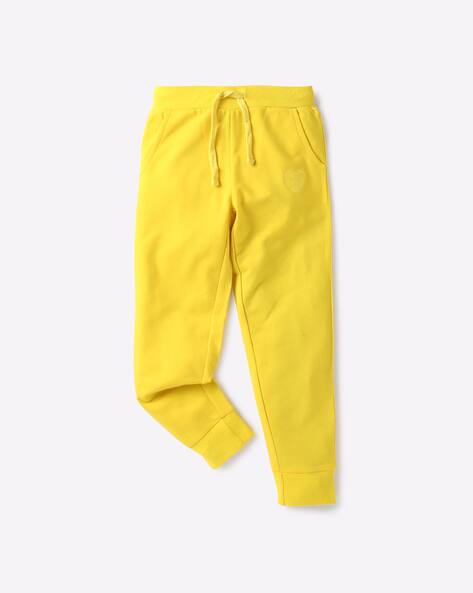 yellow track pants