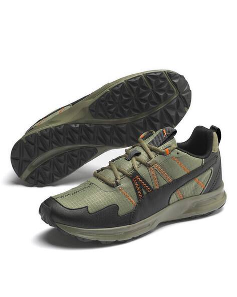 puma green sports shoes