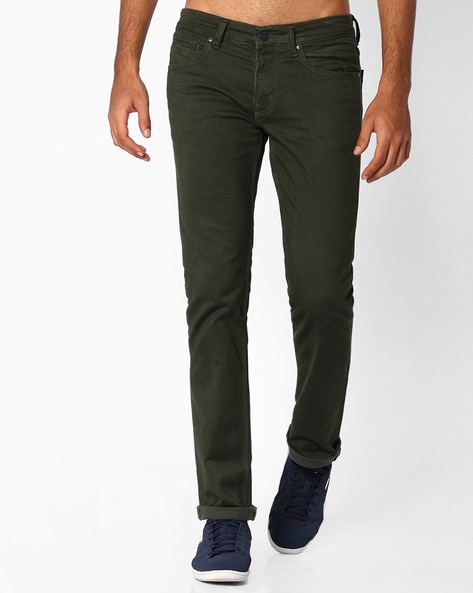 green slim fit jeans