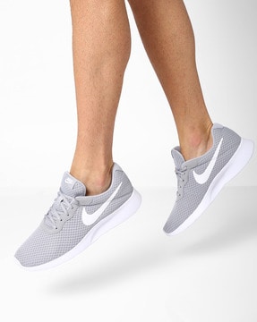 nike grey sports shoes