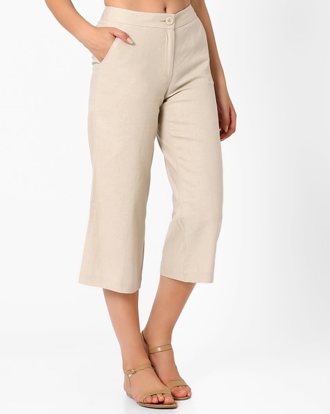 Beige cropped high waisted straight leg jeans  River Island