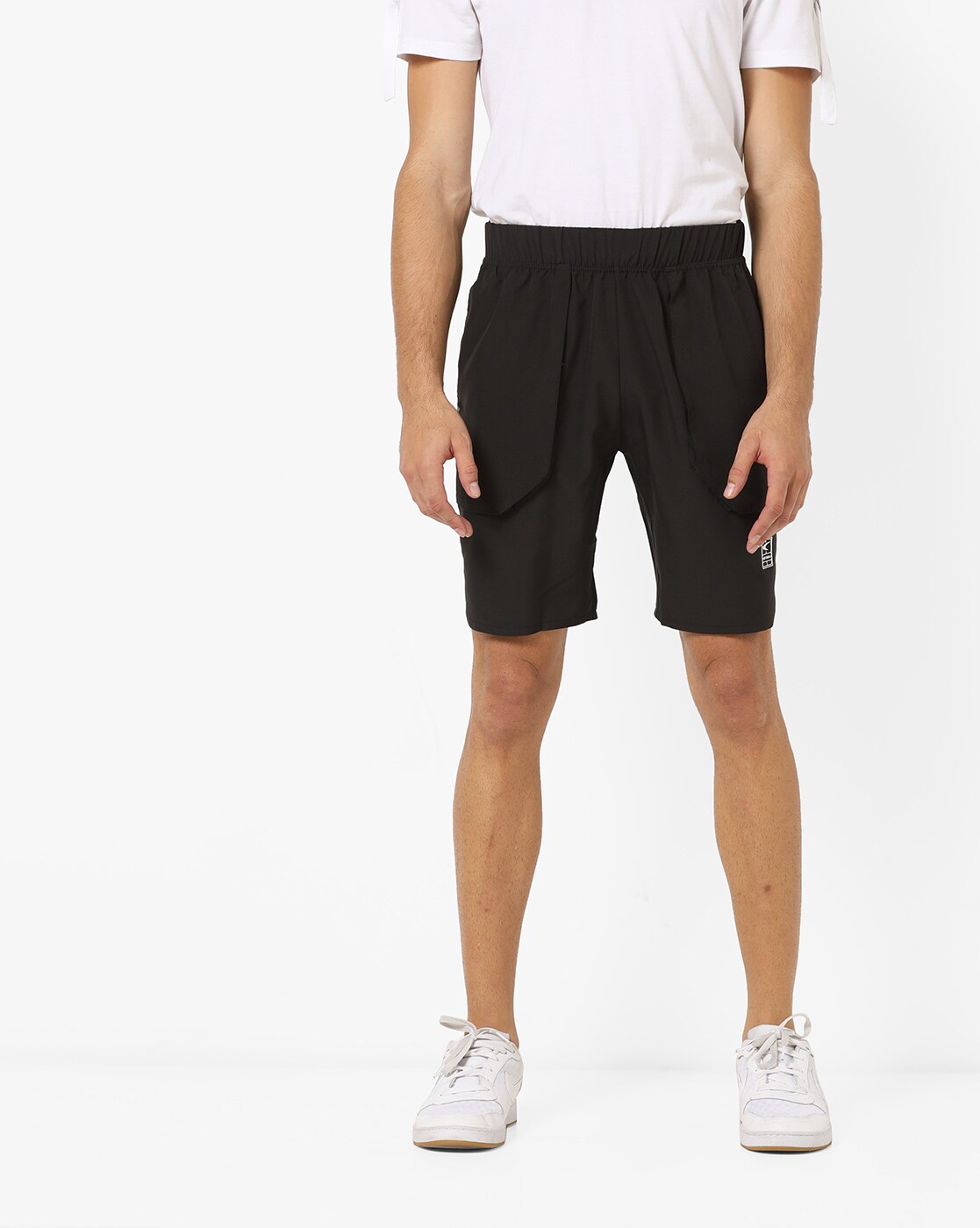 black tennis shorts with pockets