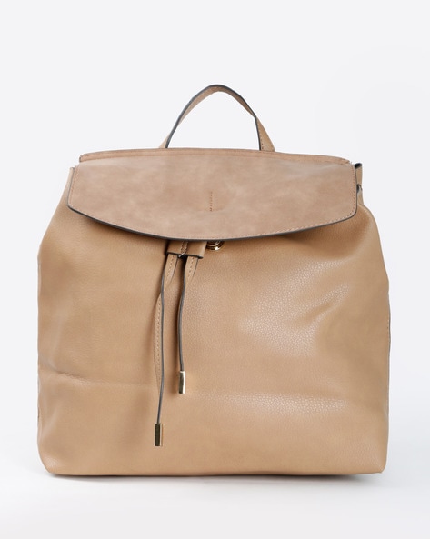 accessorize tan backpack