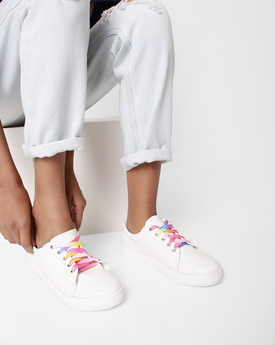 white shoes with colourful lace