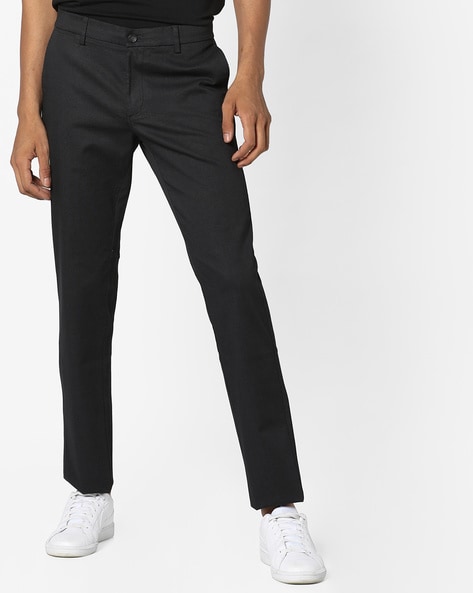 Nike Swoosh Woven sweatpants in black and cream | ASOS