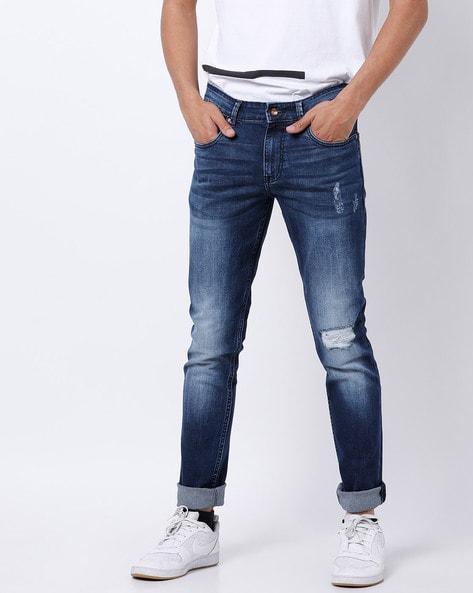 low waist tapered fit jeans