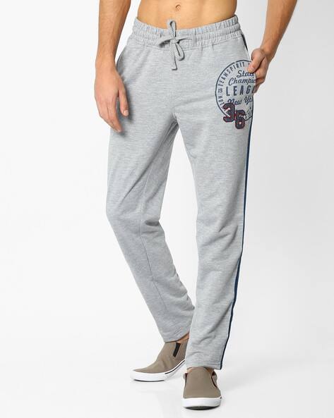 teamspirit track pants with side stripes