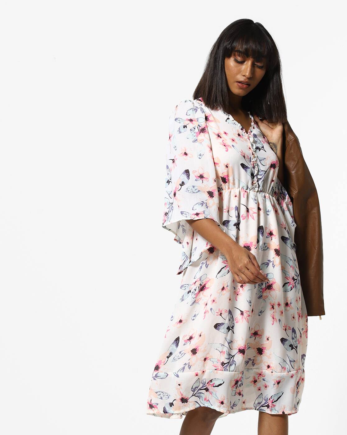 white flare dress with sleeves