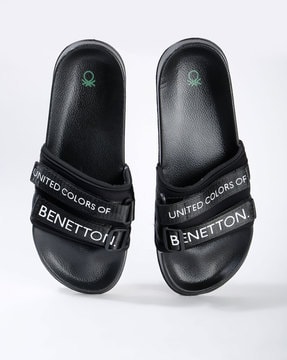 ucb black slippers