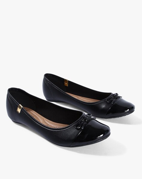 black flat shoes with bow