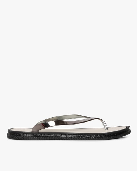 metallic silver flip flops