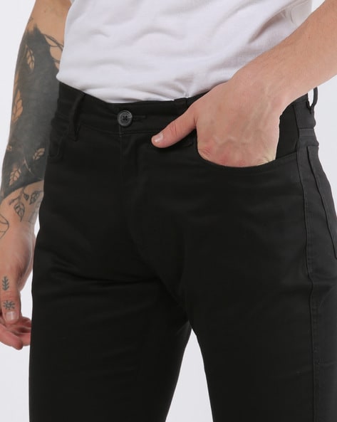 Black cropped trousers hi-res stock photography and images - Alamy