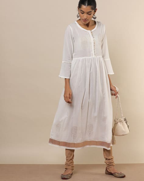 white fit and flare dress with sleeves
