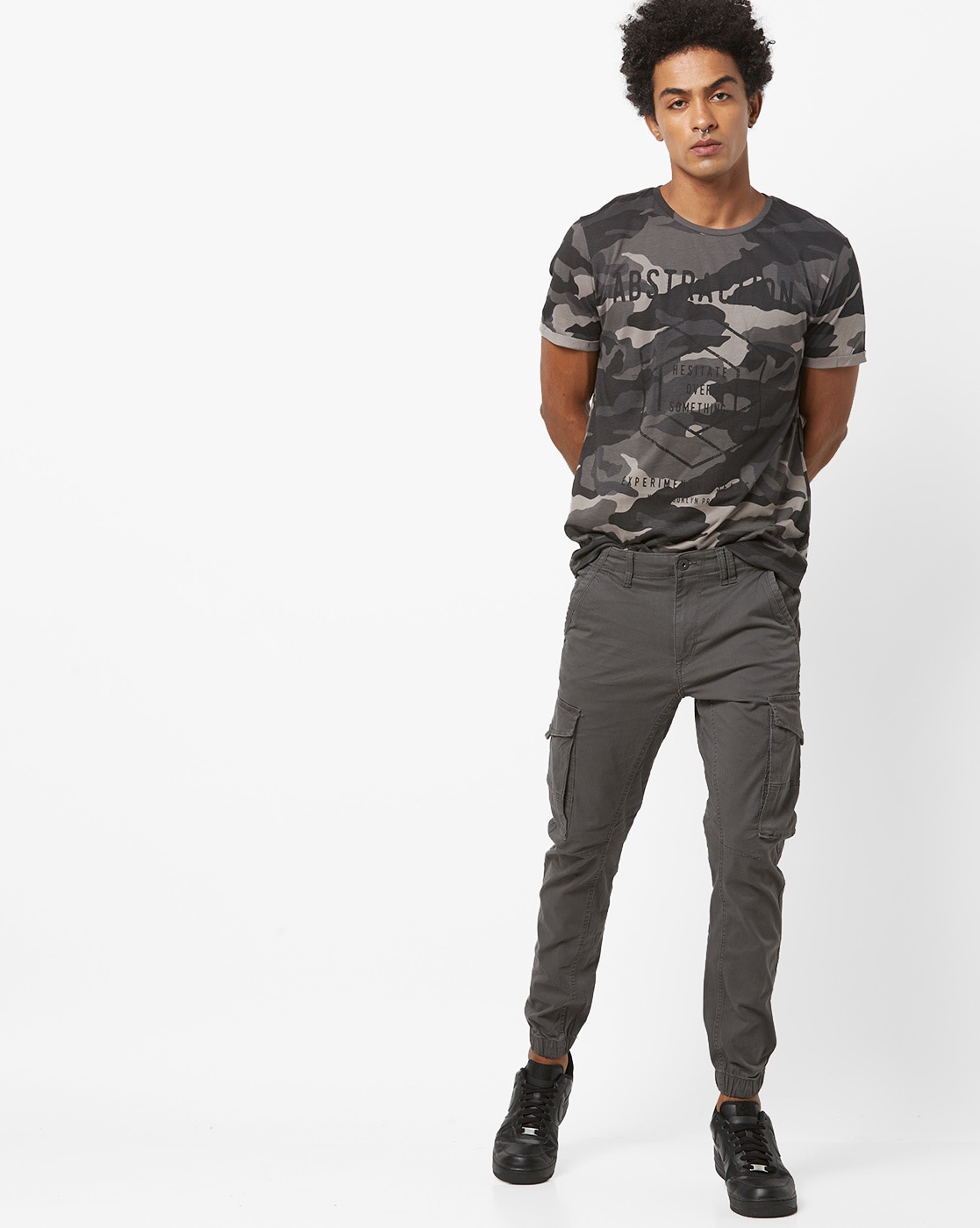 Buy Men Beige Mid Rise Cargo Pants Online In India