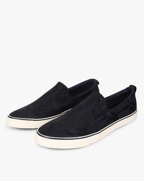 Ucb new arrivals black sneakers