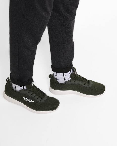dark green athletic shoes