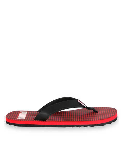 puma red and black slippers