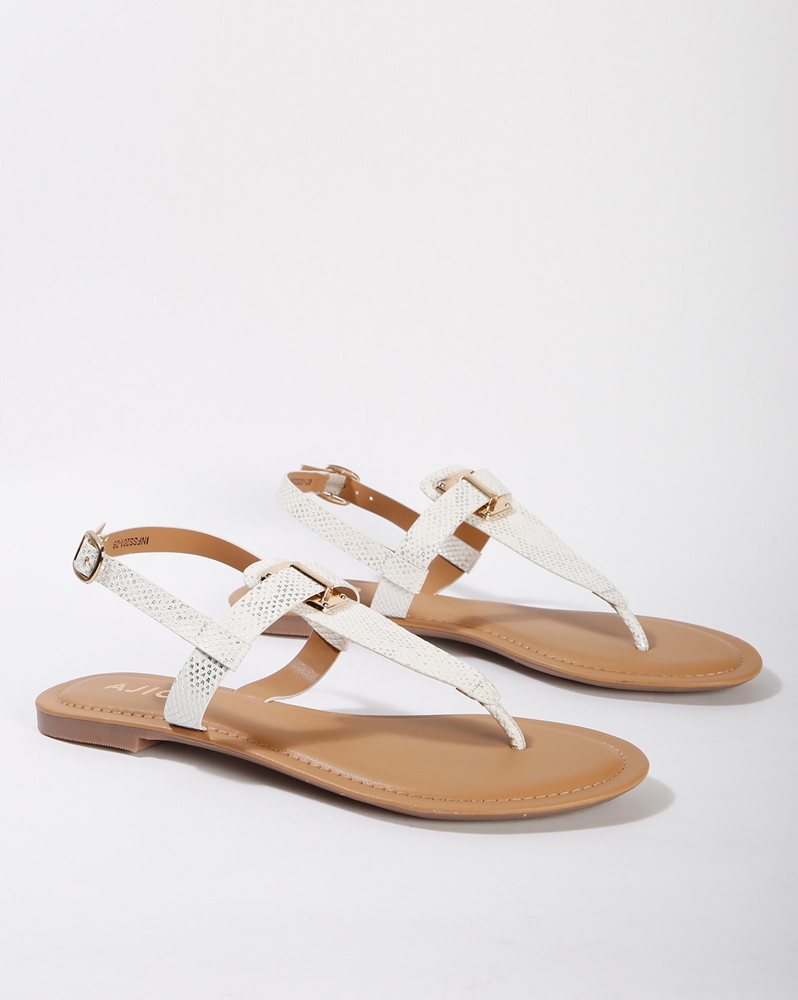 white flat sandals