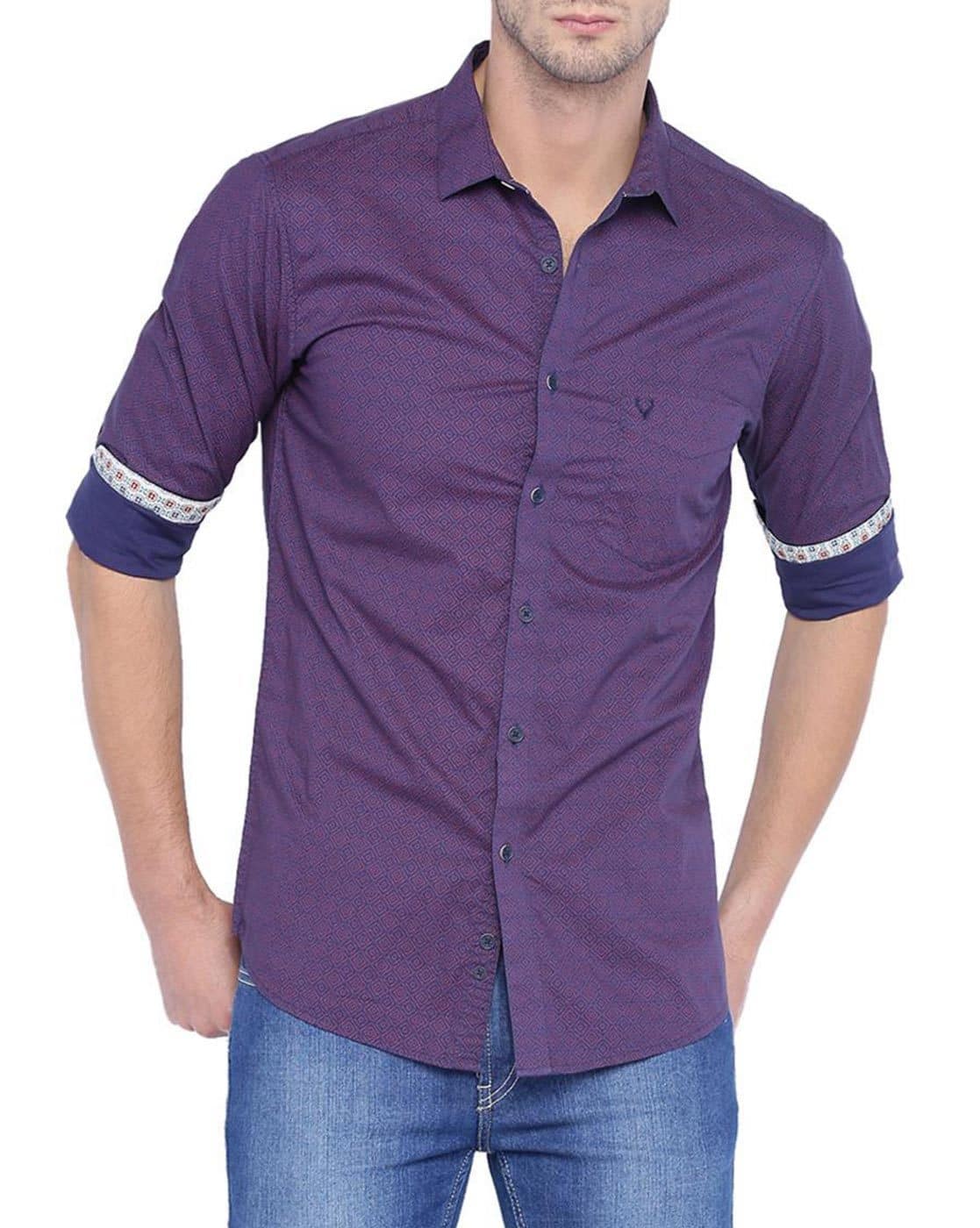 purple shirt and blue jeans