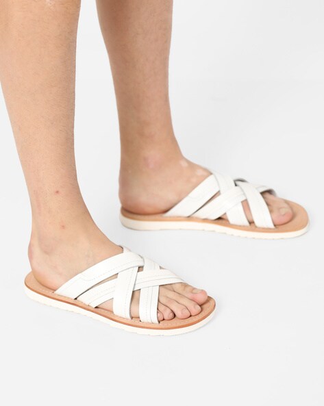 white criss cross slippers