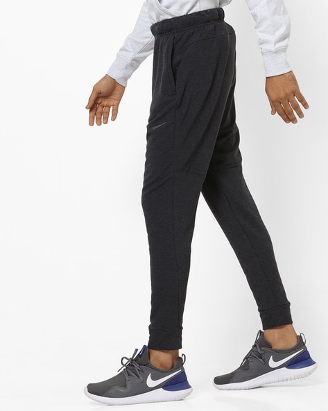 Buy Grey Track Pants for Men by NIKE Online