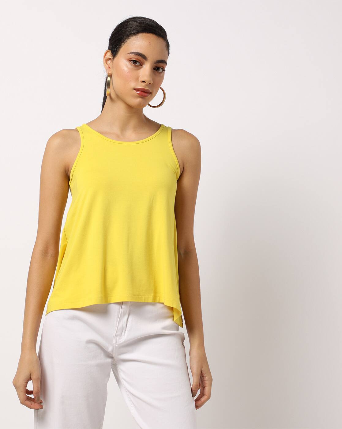 yellow sleeveless top
