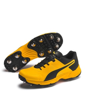 puma yellow cricket shoes