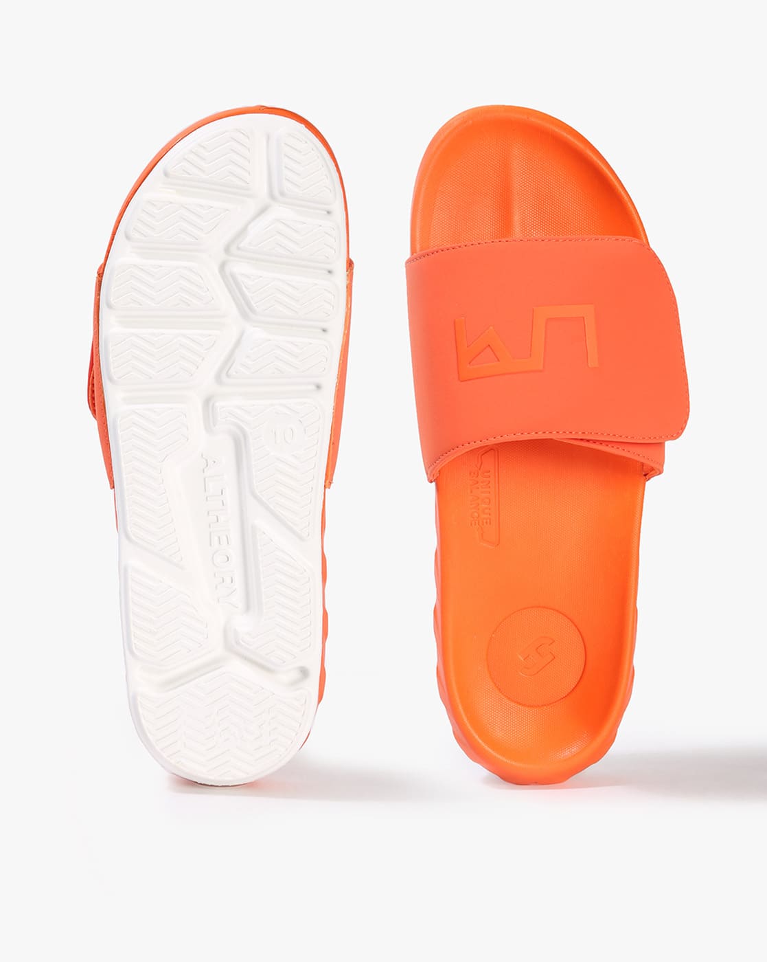 neon orange nike sandals