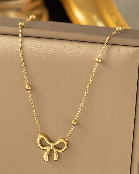 Jewels galaxy Women Gold-Plated Anti Tarnish Bow Pendant