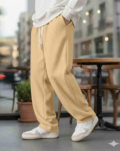 Buy TROMKO Men Relaxed Fit Pants with In Online | Ajio.com