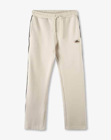 Buy Beige Track Pants for Boys by YB DNMX Online | Ajio.com