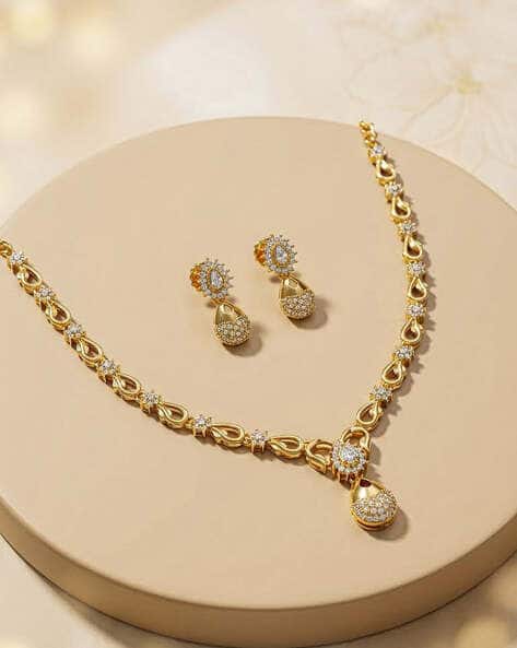 BRADO JEWELLERY Women Gold-Plated American Diamond-Studded Necklace & Earrings Set