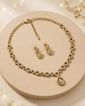 Women Gold-Plated American Diamond-Studded Necklace & Earrings Set -image-33
