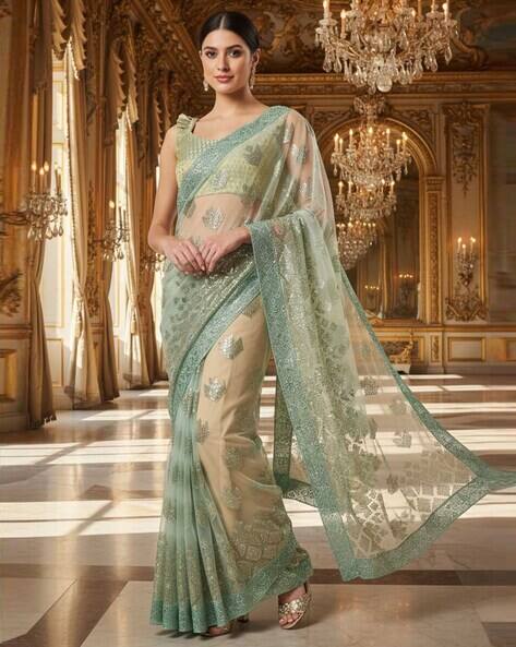 Nyrika Women Embellished Net Saree