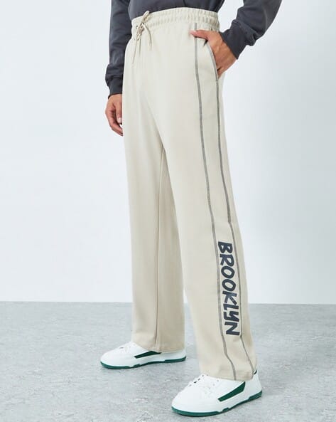Styli Men Oversized Side Panel Printed Joggers