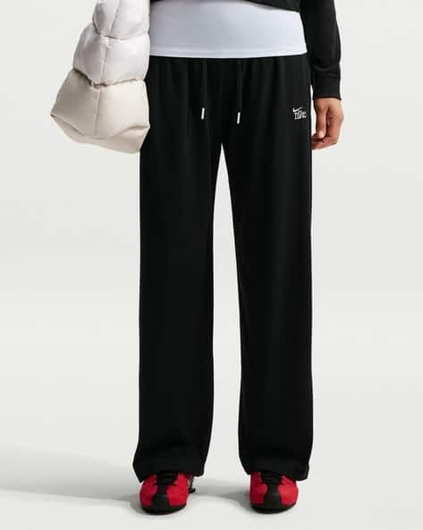 nike tracksuit bottoms with zip legs