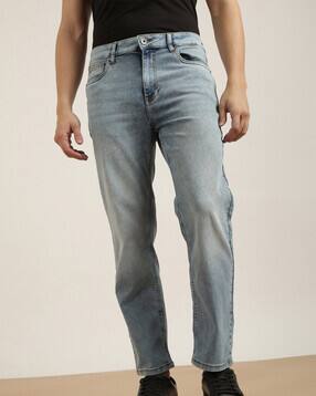 men lightly washed slim fit mid-rise jeans
